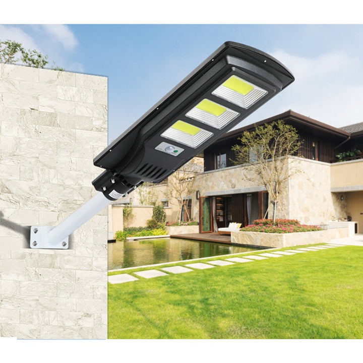 Proiector solar 300W, 450 LED iluminat stradal, cu panou solar integrat, senzor de miscare si telecomanda - Shopmix